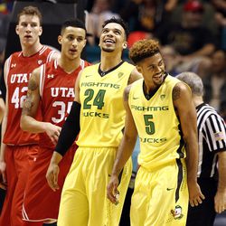 Oregon Ducks forward Dillon Brooks (24) and guard Tyler Dorsey (5) celebrate after a play during the second half of the Pac-12 conference tournament championship game against the Utah Utes at the MGM Grand Garden Arena in Las Vegas, Saturday, March 12, 2016.