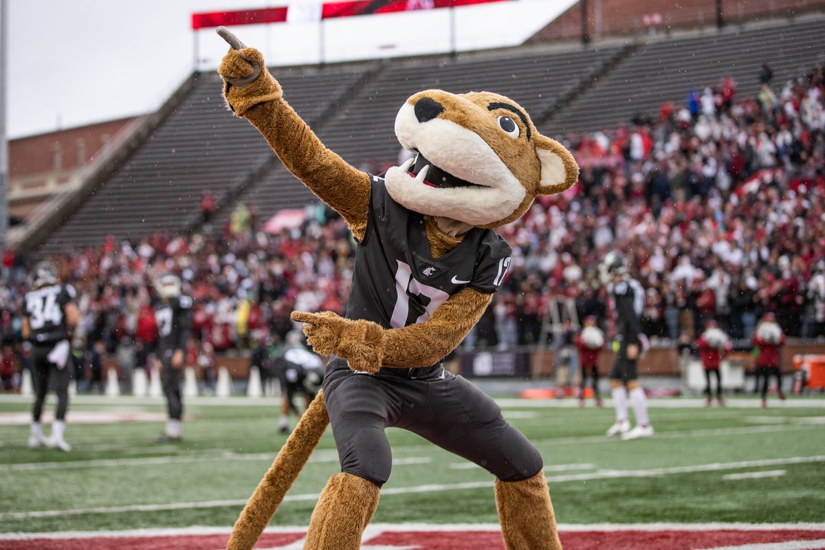PULLMAN, WA - SEPTEMBER 18: Washington State mascot Butch T Cougar hypes up the crowd prior to a PAC 12 conference matchup between the USC Trojans and the Washington State Cougars on September 18, 2021, at Martin Stadium in Pullman, WA.