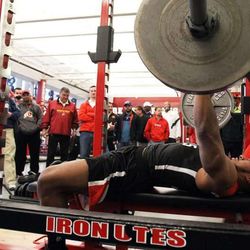 FILE — John White lifts weights during Utah Pro Day at the University of Utah in Salt Lake City, Wednesday, March 20, 2013. At the moment, there is no heir apparent to the graduated Utah starting running back.
