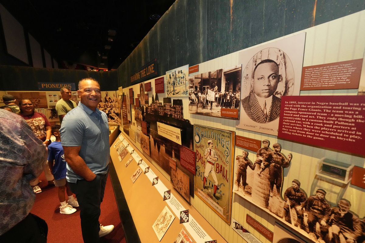 Dodgers manager Dave Roberts during a tour of the Negro Leagues Baseball Museum in Kansas City on August 13, 2022.