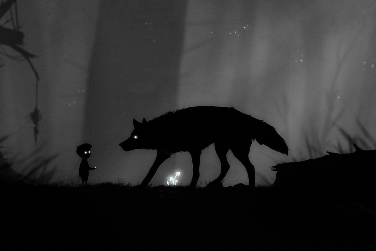 a wolf confronts a boy in the forest in the black-and-white game Limbo