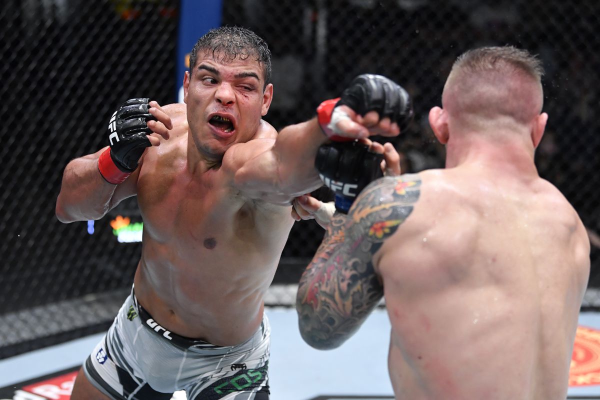 (L-R) Paulo Costa of Brazil punches Marvin Vettori of Italy in a light heavyweight fight during the UFC Fight Night event at UFC APEX on October 23, 2021 in Las Vegas, Nevada.