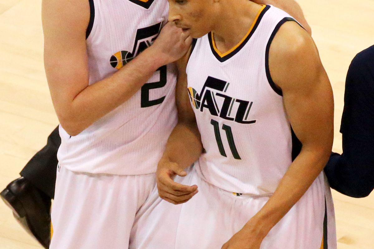 Utah Jazz forward Joe Ingles (2) talks to Utah Jazz guard Dante Exum (11) during a time out in game 4 of the second round of NBA playoffs at the Vivint Smart Home Arena in Salt Lake City on Monday, May 8, 2017. The Jazz lost 95-121.
