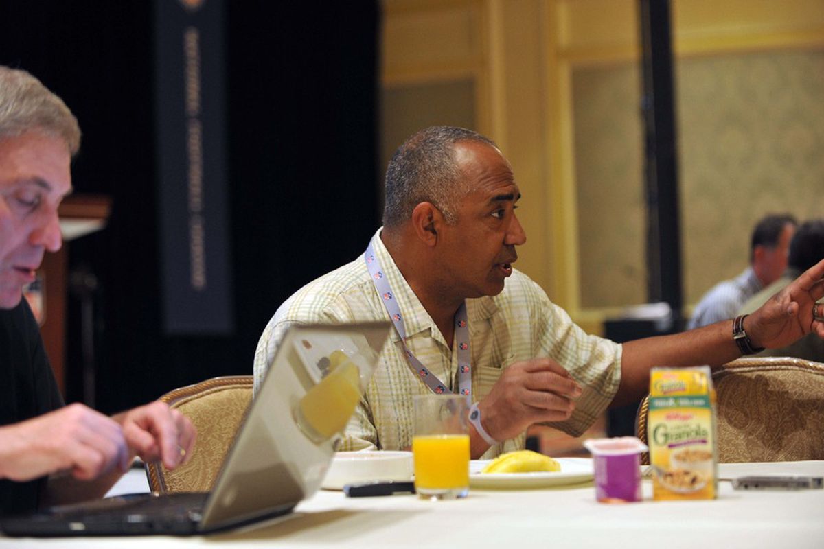March 27,  2012; Palm Beach, FL, USA; Cincinnati Bengals head coach Marvin Lewis (right) talks with a reporter during the AFC head coaches media breakfast at the Breakers Hotel. Mandatory Credit: Steve Mitchell-US PRESSWIRE