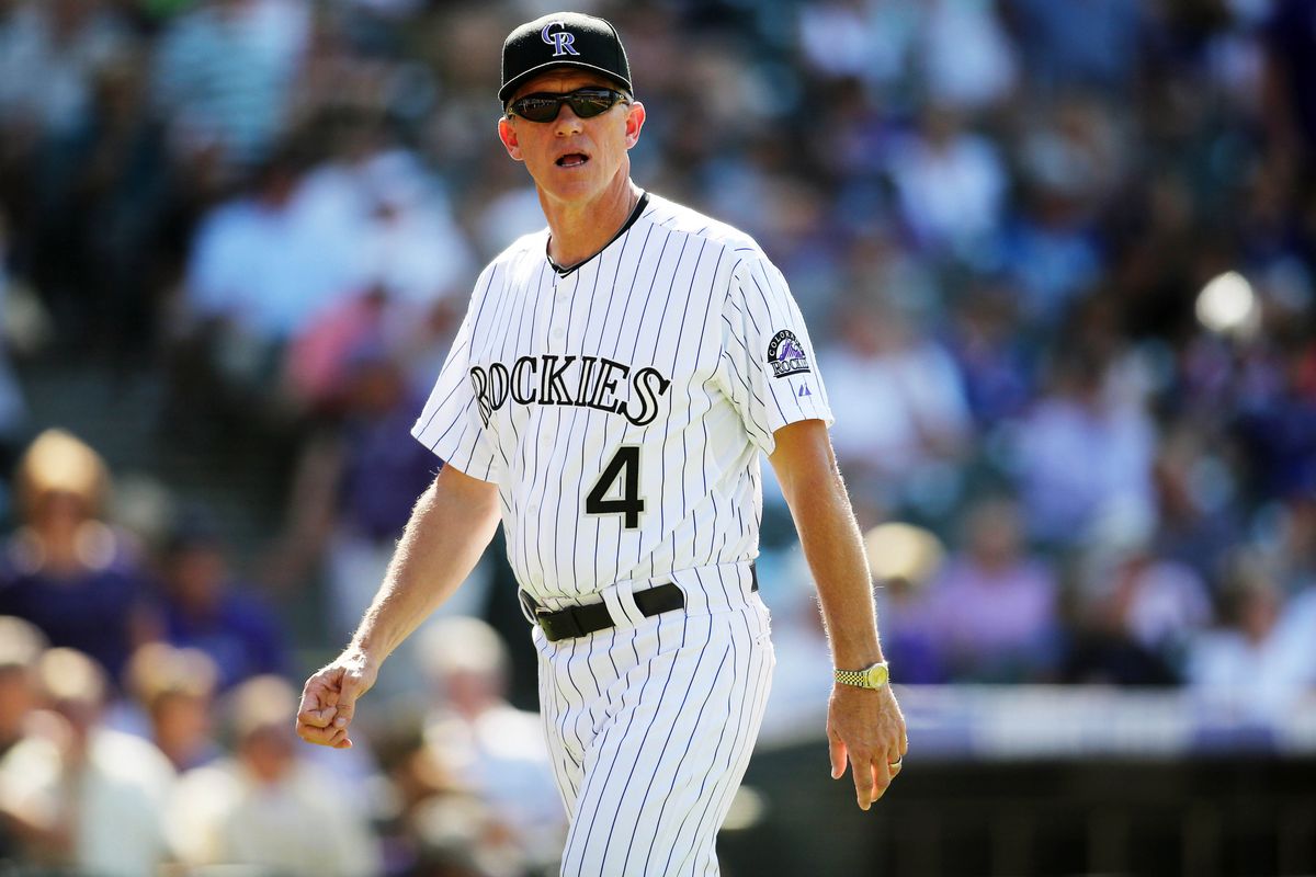 August 19, 2012; Denver, CO, USA; Colorado Rockies manager jim Tracy (4) walks off the field after arguing a call during the eighth inning against the Miami Marlins at Coors Field.  The Rockies won 3-2.  Mandatory Credit: Chris Humphreys-US PRESSWIRE