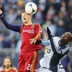 Real's Luis Gil and Kansas City's Lawrence Olum battle for the ball as Real Salt Lake and Sporting KC play Saturday, Dec. 7, 2013 in MLS Cup action.