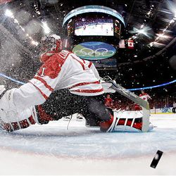 Roberto Luongo of Canada gives up a goal against Russia during the ice hockey men's quarterfinal game on day 13 of the Vancouver 2010 Winter Olympics at Canada Hockey Place on Wednesday. Canada won the game.