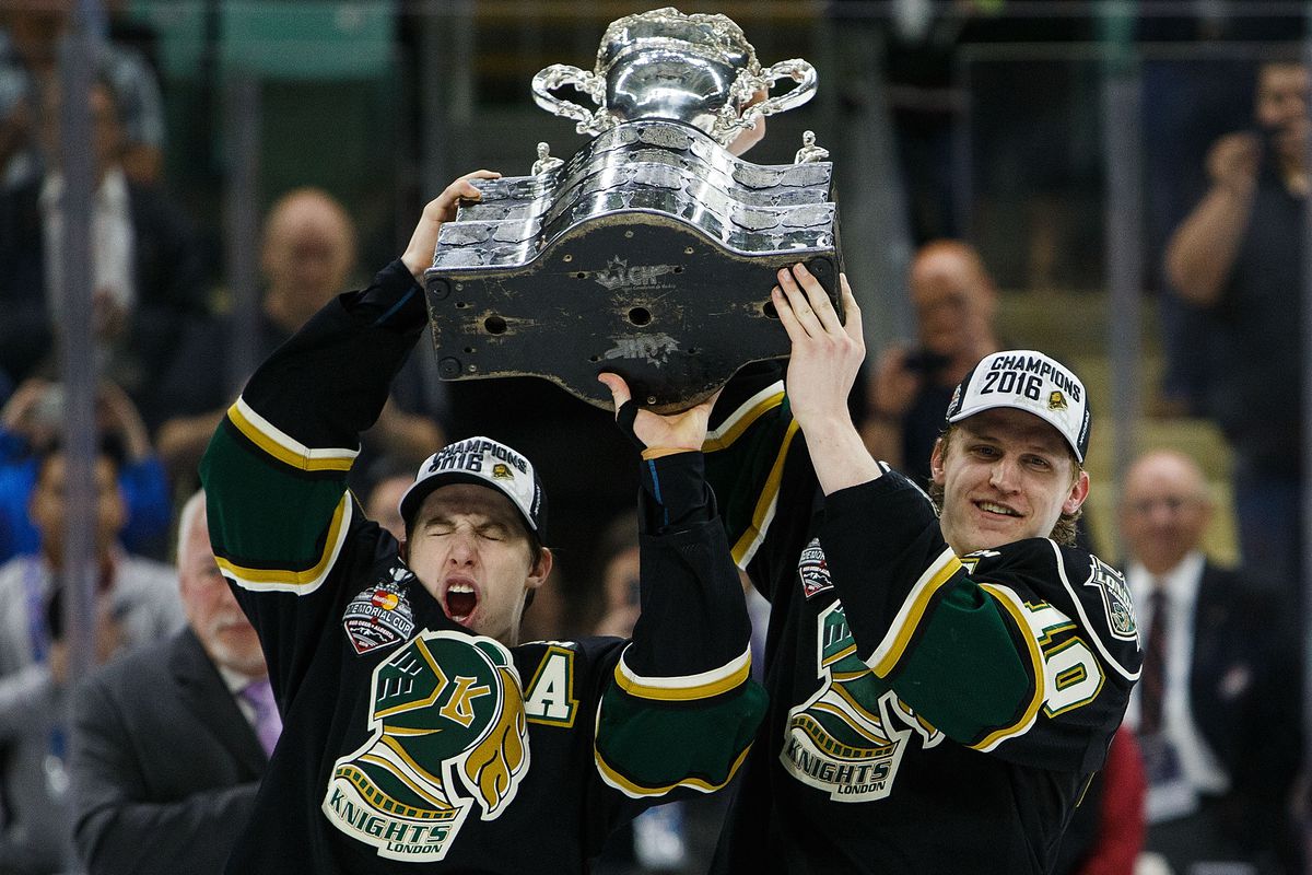 Mitchell Marner #93 and Christian Dvorak #10 of the London Knights (OHL) celebrate after defeating the Rouyn-Noranda Huskies (QMJHL) during the Memorial Cup Final on May 29, 2016 at the Enmax Centrium in Red Deer, Alberta, Canada.