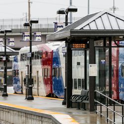 Electronic signs indicated the schedules for upcoming FrontRunner train departures at the Utah Transit Authority's Salt Lake Central Station on Tuesday, Dec. 6, 2016.