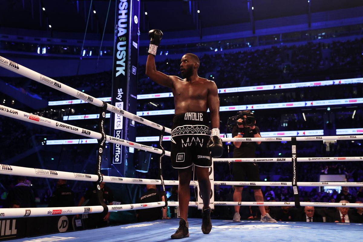 Lawrence Okolie celebrates following the WBO World Cruiserweight title fight between Lawrence Okolie and Dilan Prasovic at Tottenham Hotspur Stadium on September 25, 2021 in London, England.