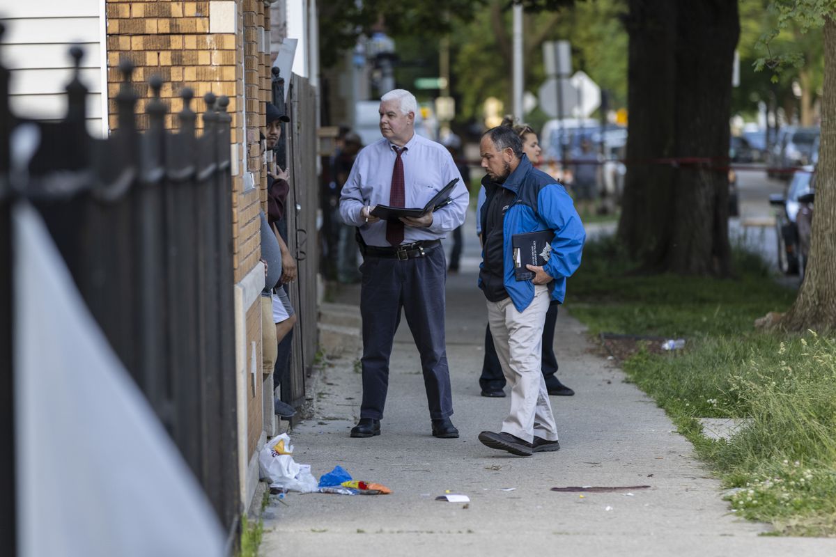Police investigate the shooting of 14-year-old Savanah Quintero Wednesday in the 1700 block of West 48th Street in Back of Yards.