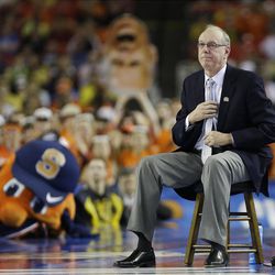 Syracuse head coach Jim Boeheim watches play against Michigan during the second half of the NCAA Final Four tournament college basketball semifinal game Saturday, April 6, 2013, in Atlanta. (AP Photo/Charlie Neibergall) 