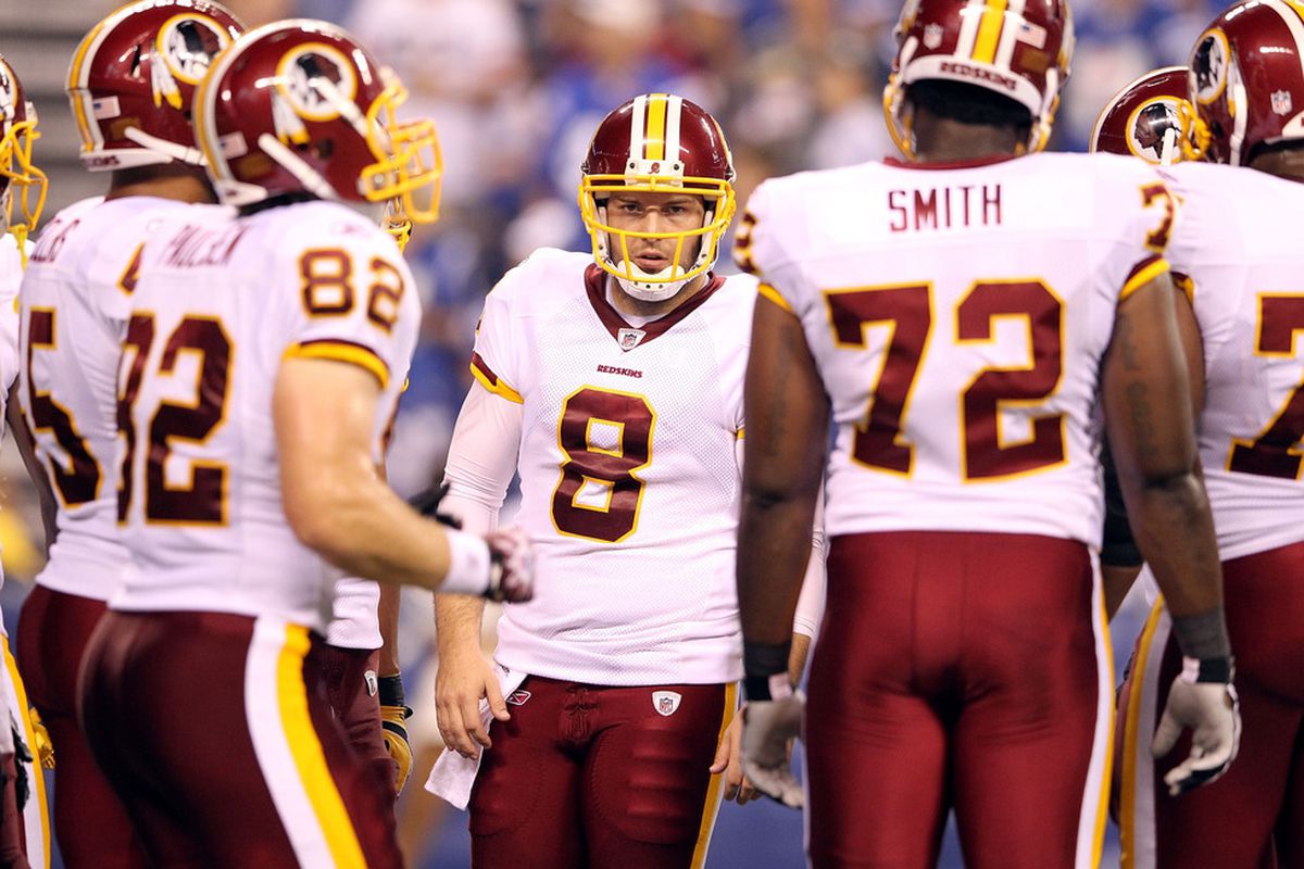 INDIANAPOLIS, IN - AUGUST 19:  Rex Grossman #8 of the Washington Redskins calls a play in the huddle during the game against Indianapolis Colts at Lucas Oil Stadium on August 19, 2011 in Indianapolis, Indiana.  (Photo by Andy Lyons/Getty Images)
