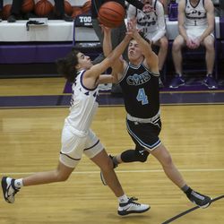 Action in the first round of the boys 4A basketball tournament between Canyon View and Tooele at Tooele High School on Tuesday, Feb. 23, 2021.