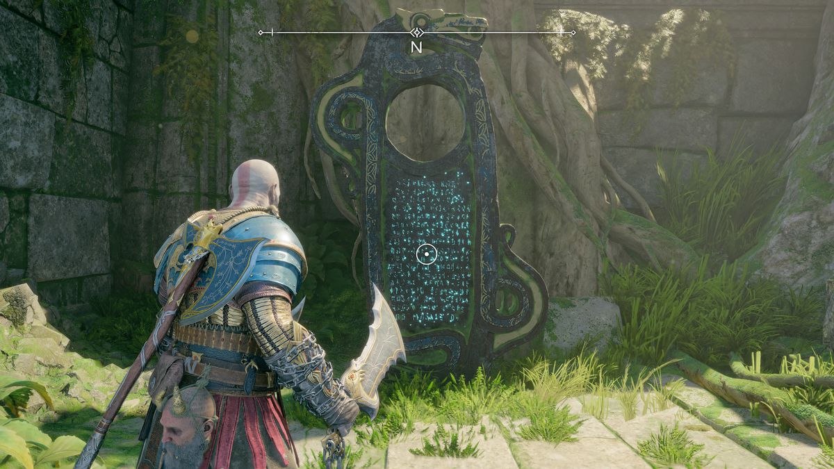 Kratos reads a Lore Monolith