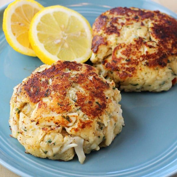 Two jumbo crab cakes on a plate