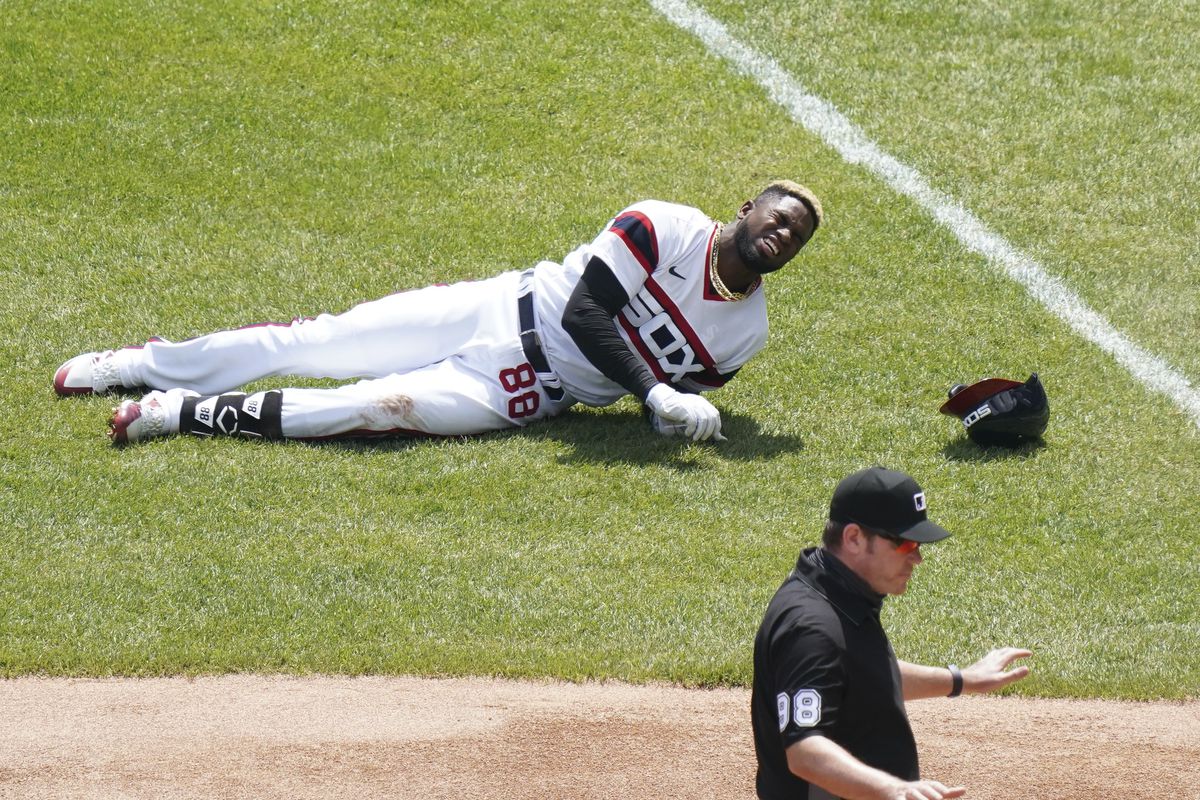 White Sox center fielder Luis Robert will be out for at least three months with a torn right hip flexor. 