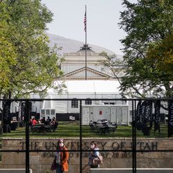 The media tent and a perimeter fence are seen on Presidents Circle at the University of Utah in Salt Lake City on Tuesday, Oct. 6, 2020, in preparation for Wednesday’s vice presidential debate.