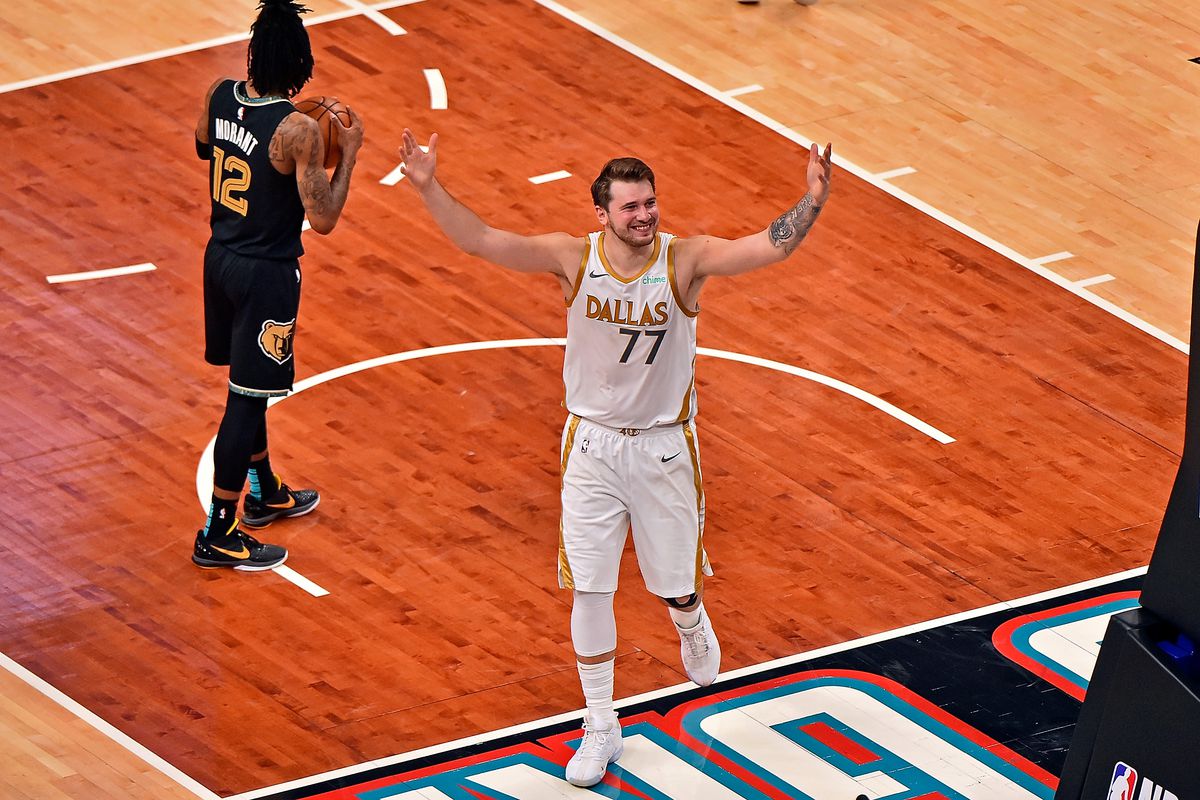 Luka Doncic #77 of the Dallas Mavericks reacts after scoring the game winning shot against the Memphis Grizzlies at FedExForum on April 14, 2021 in Memphis, Tennessee.