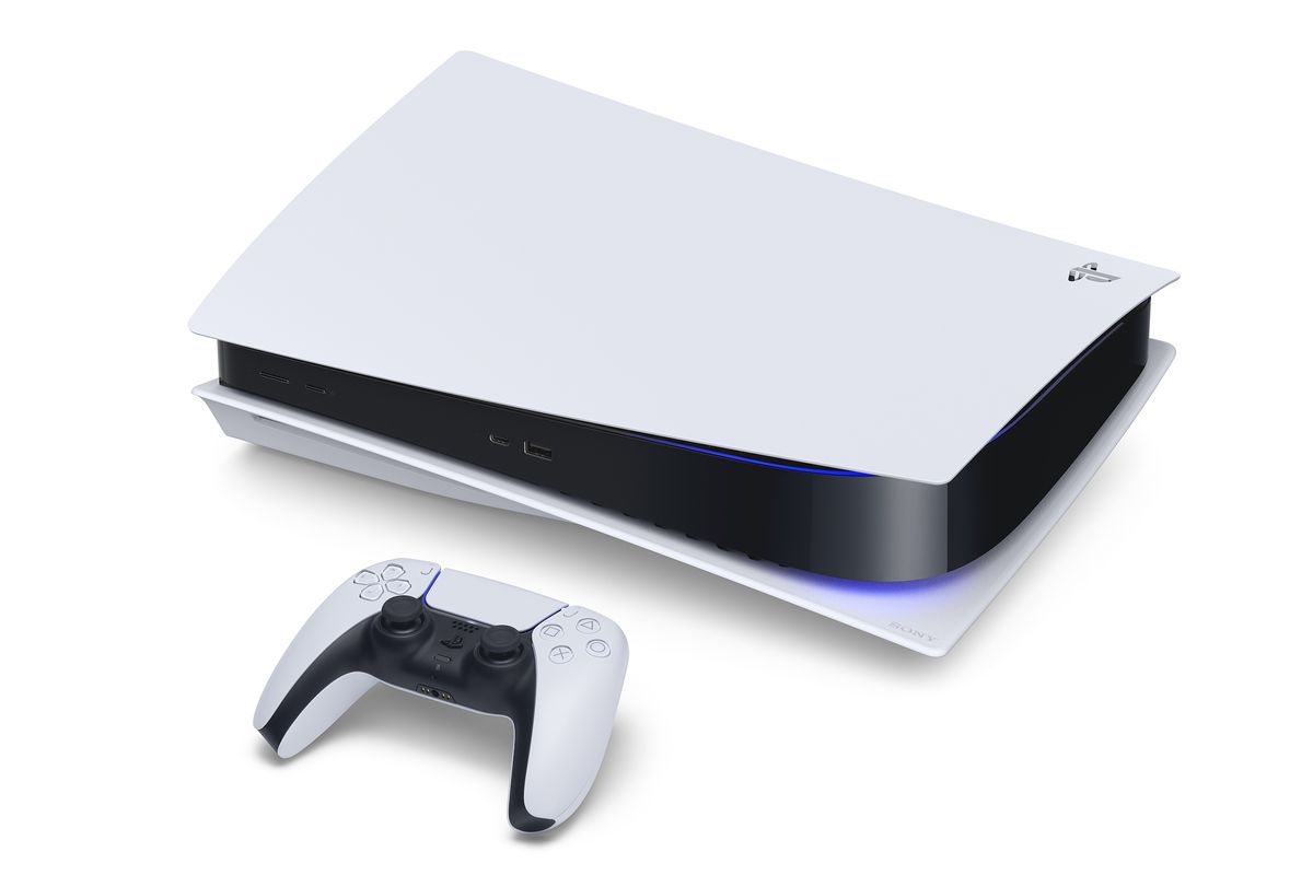 top angle view of PS5 with DualSense controller sitting in front of it