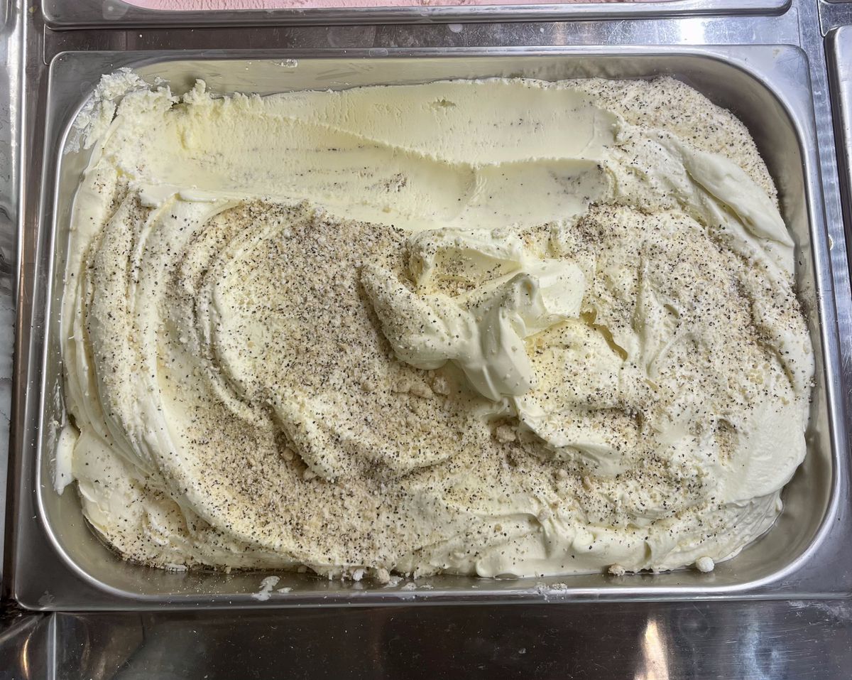 A tray of cacio e pepe ice cream from Craft Creamery, sprinkled with spices.