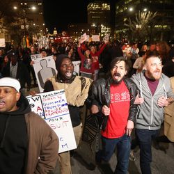 Several hundred protesters march in the streets of Salt Lake City in support of Abdullahi Mohamed on Monday, Feb. 29, 2016. 