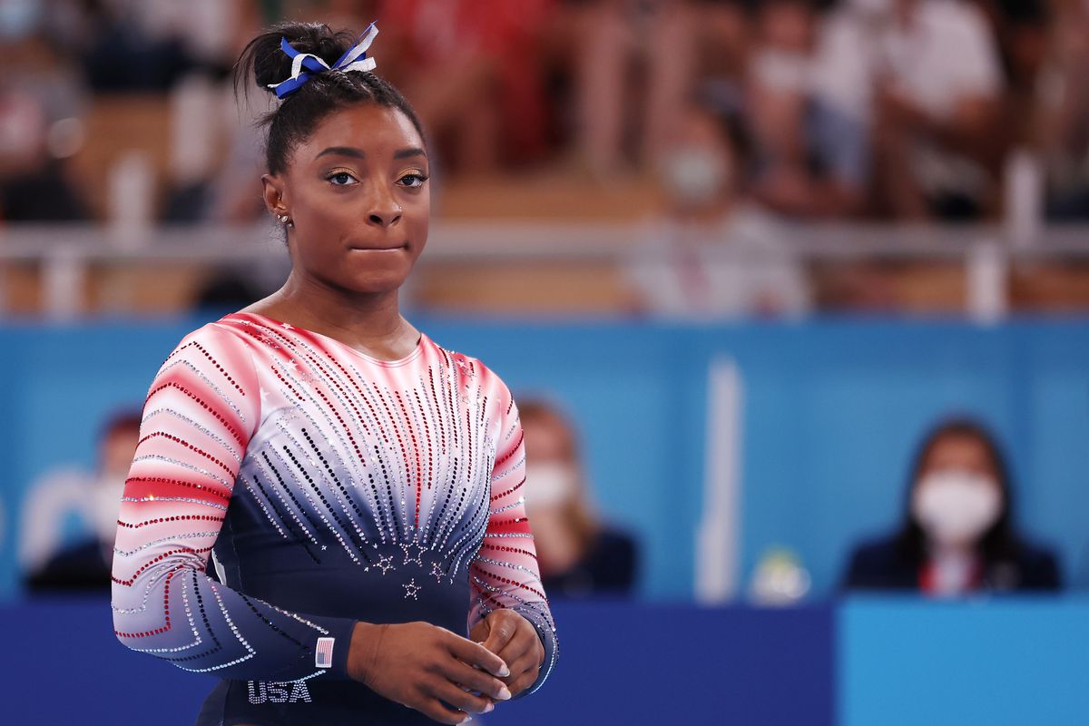 Simone Biles competes in the women’s balance beam final Aug. 3 in Tokyo.