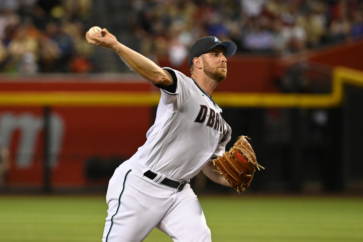 Merrill Kelly #29 of the Arizona Diamondbacks delivers a pitch against the Minnesota Twins at Chase Field on June 19, 2022 in Phoenix, Arizona.