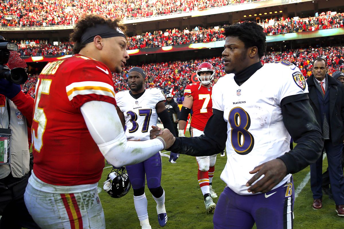 Kansas City Chiefs quarterback Patrick Mahomes shakes hands with Baltimore Ravens quarterback Lamar Jackson after the Chiefs defeated the Ravens 27-24 in overtime to win the game at Arrowhead Stadium on December 09, 2018 in Kansas City, Missouri.