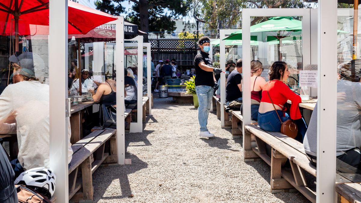 Zeitgeist has turned the picnic tables on its patio into glass booths