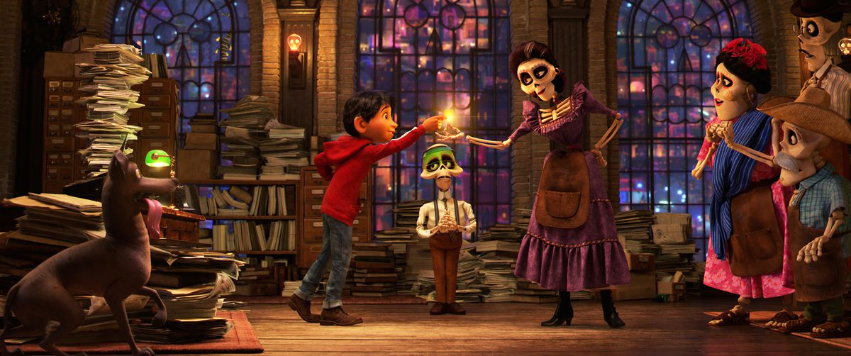 Miguel and his great-great-grandmother, Mama Imelda, from Pixar’s Coco. 