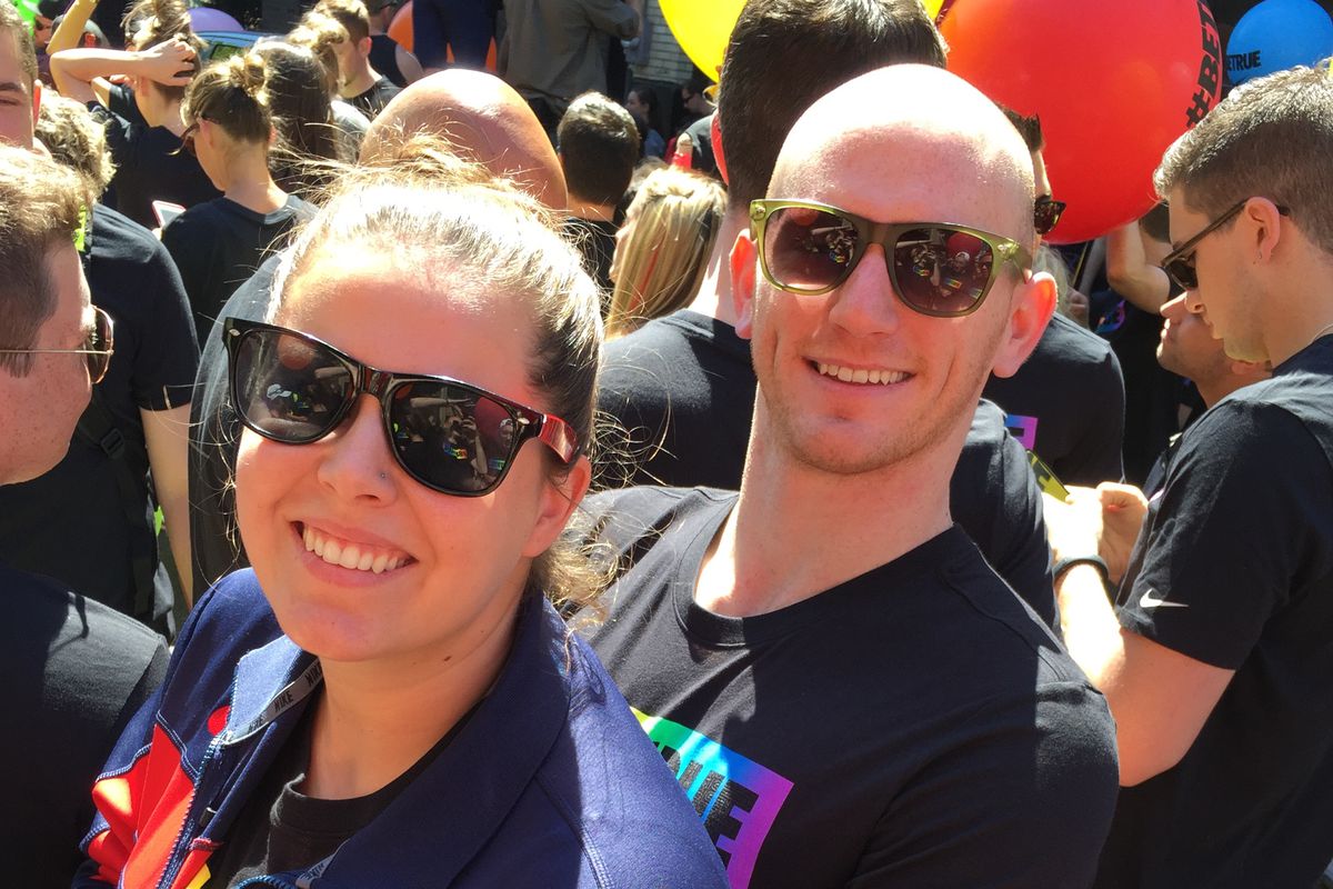 Lauren Neidigh with fellow swimmer Jon Denton-Schneider at the Portland Pride parade