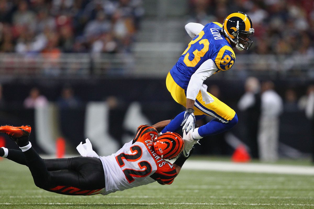 ST. LOUIS, MO - DECEMBER 18: Nate Clements #22 of the Cincinnati Bengals tackles Brandon Lloyd #83 of the St. Louis Rams at the Edward Jones Dome on December 18, 2011 in St. Louis, Missouri.  (Photo by Dilip Vishwanat/Getty Images)