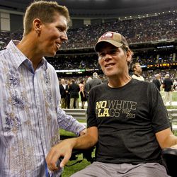 Joe Unitas son of former NFL quarterback Johnny Unitas greets former New Orleans Saints defensive back Steve Gleason prior to kickoff of a game against the San Diego Chargers at the Mercedes-Benz Superdome.