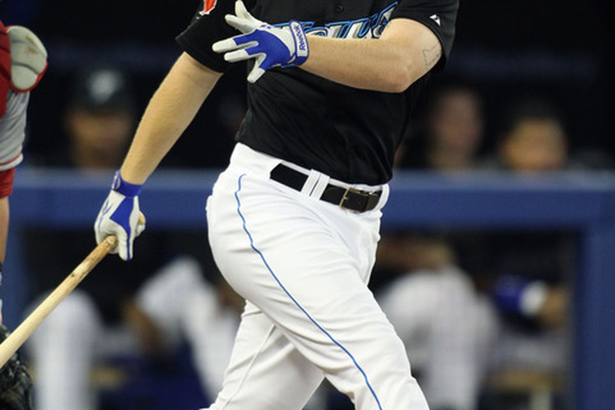 TORONTO,CANADA - SEPTEMBER 19:  Adam Lind #26 of the Toronto Blue Jays fouls a ball against the Los Angeles Angels of Anaheim in a MLB game on September 19, 2011 at the Rogers Centre in Toronto, Canada. (Photo by Claus Andersen/Getty Images)