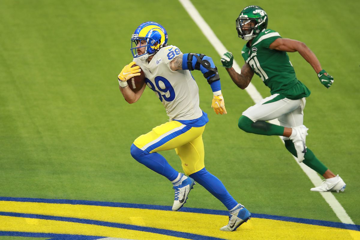 Tyler Higbee #89 of the Los Angeles Rams runs against Blessuan Austin #31 of the New York Jets in the third quarter at SoFi Stadium on December 20, 2020 in Inglewood, California.