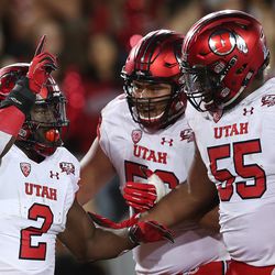 Utah Utes running back Zack Moss (2) celebrates with teammates after scoring a touchdown as Utah and Stanford play a football game in Palo Alto California on Saturday, Oct. 6, 2018.