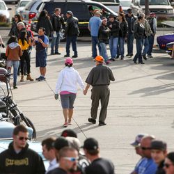 People arrive for a fundraiser and memorial car show and cruise at the Valley Fair Mall in West Valley City on Saturday, Nov. 12, 2016. The event was held in honor of Cody Brotherson, a West Valley City police officer who was killed in the line of duty.
