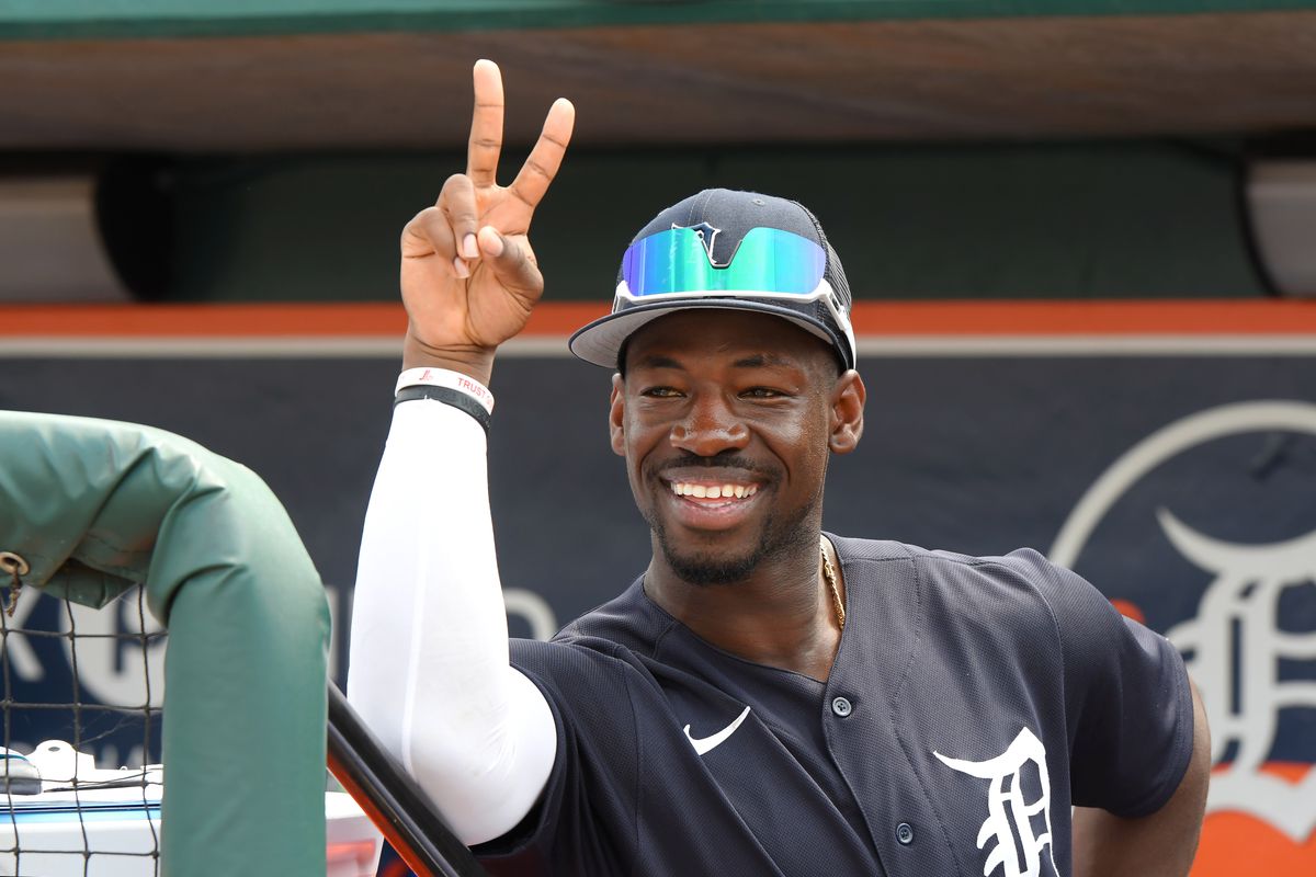 Jonathan Davis #39 of the Detroit Tigers looks on from the dugout and smiles prior to the Spring Training game against the Washington Nationals at Publix Field at Joker Marchant Stadium on March 8, 2023 in Lakeland, Florida. The Tigers defeated the Nationals 2-1.