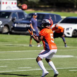 Denver Broncos rookie wide receiver, Isaiah McKenzie, fielding punts during the first day of training camp. 