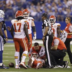 Kansas City Chiefs quarterback Alex Smith lays on the field after getting hit during the second half of an NFL football game against the Indianapolis Colts, Sunday, Oct. 30, 2016, in Indianapolis. (AP Photo/Michael Conroy) 