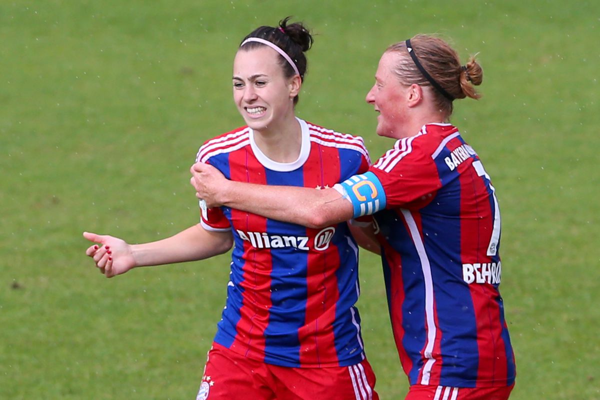 Schnaderbeck and Behringer celebrate Bayern's third goal of the match