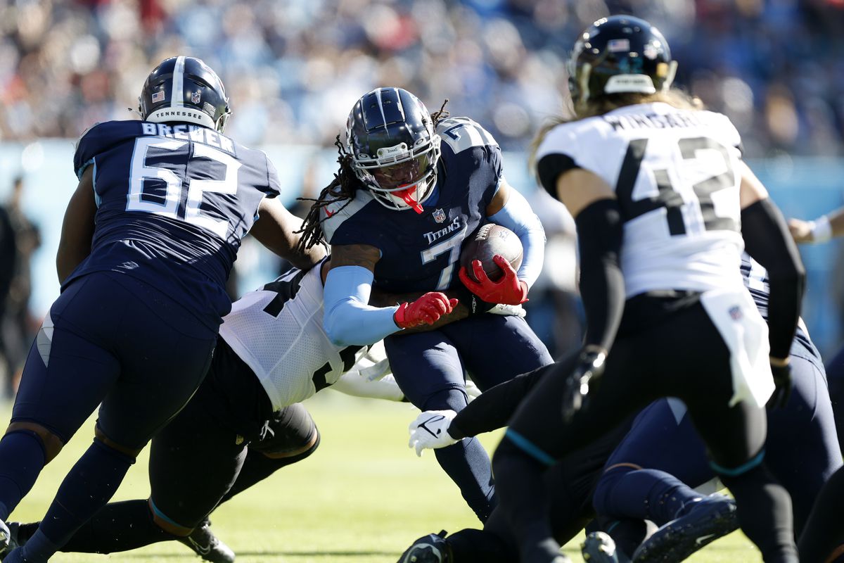 D’Onta Foreman #7 of the Tennessee Titans runs with the ball against the Jacksonville Jaguars during the first half at Nissan Stadium on December 12, 2021 in Nashville, Tennessee.