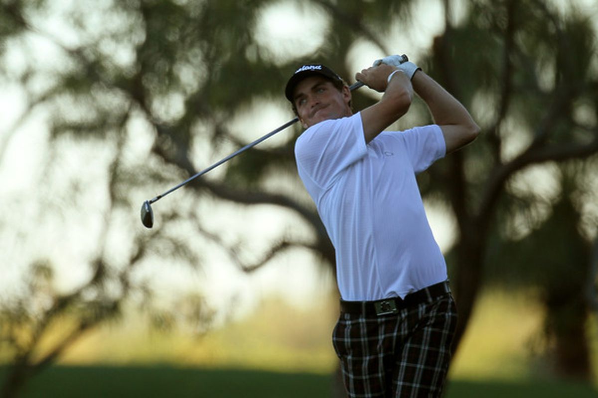 LA QUINTA CA - JANUARY 22:  Keegan Bradley hits his tee shot on the 16th hole during round four of the Bob Hope Classic at Silver Rock Resort on January 22 2011 in La Quinta California. (Photo by Stephen Dunn/Getty Images)