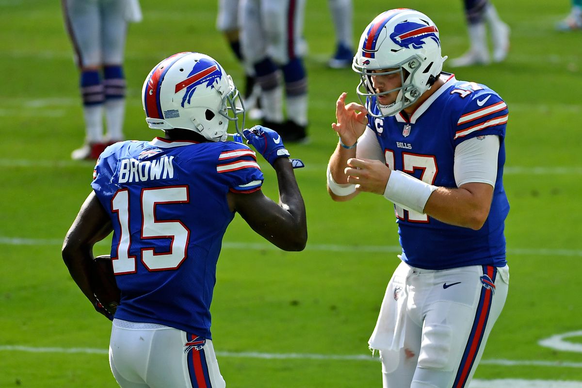 Buffalo Bills quarterback Josh Allen (17) celebrates with wide receiver John Brown (15) after a touchdown during the second half against the Miami Dolphins at Hard Rock Stadium.