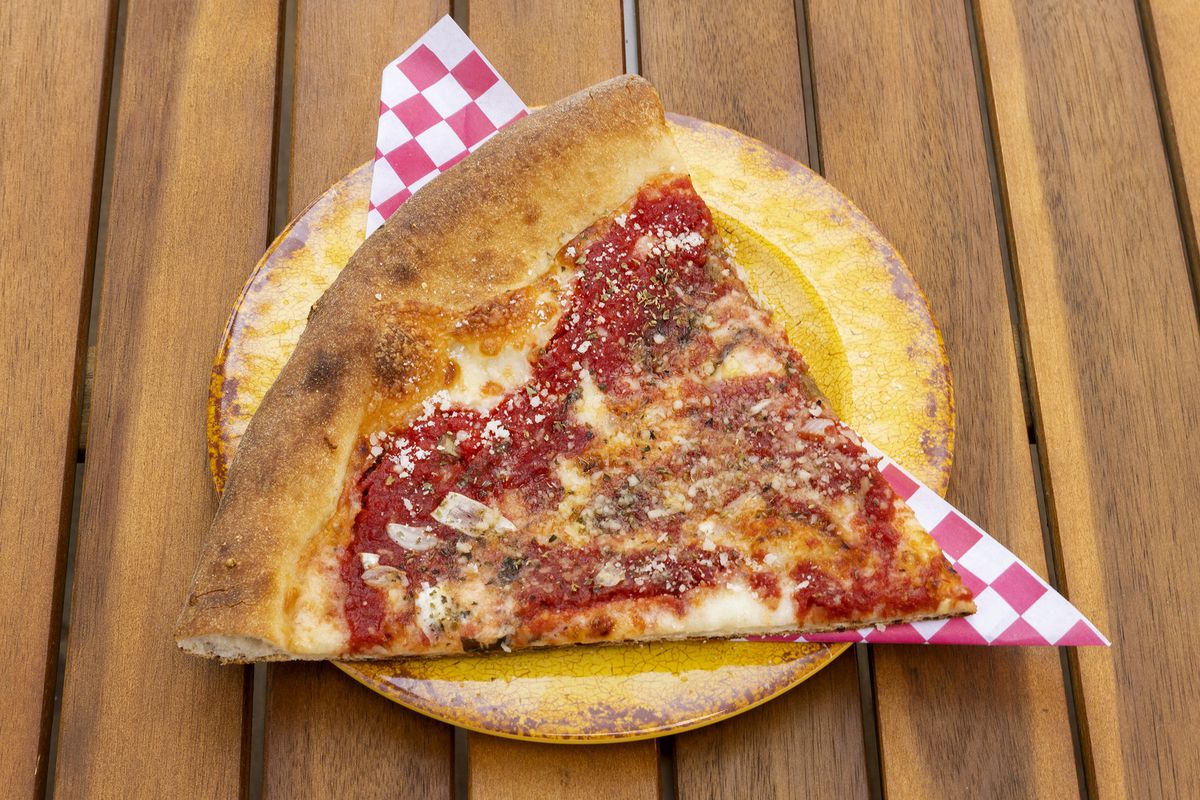 Professor Pizza’s NY style slices on a plate.