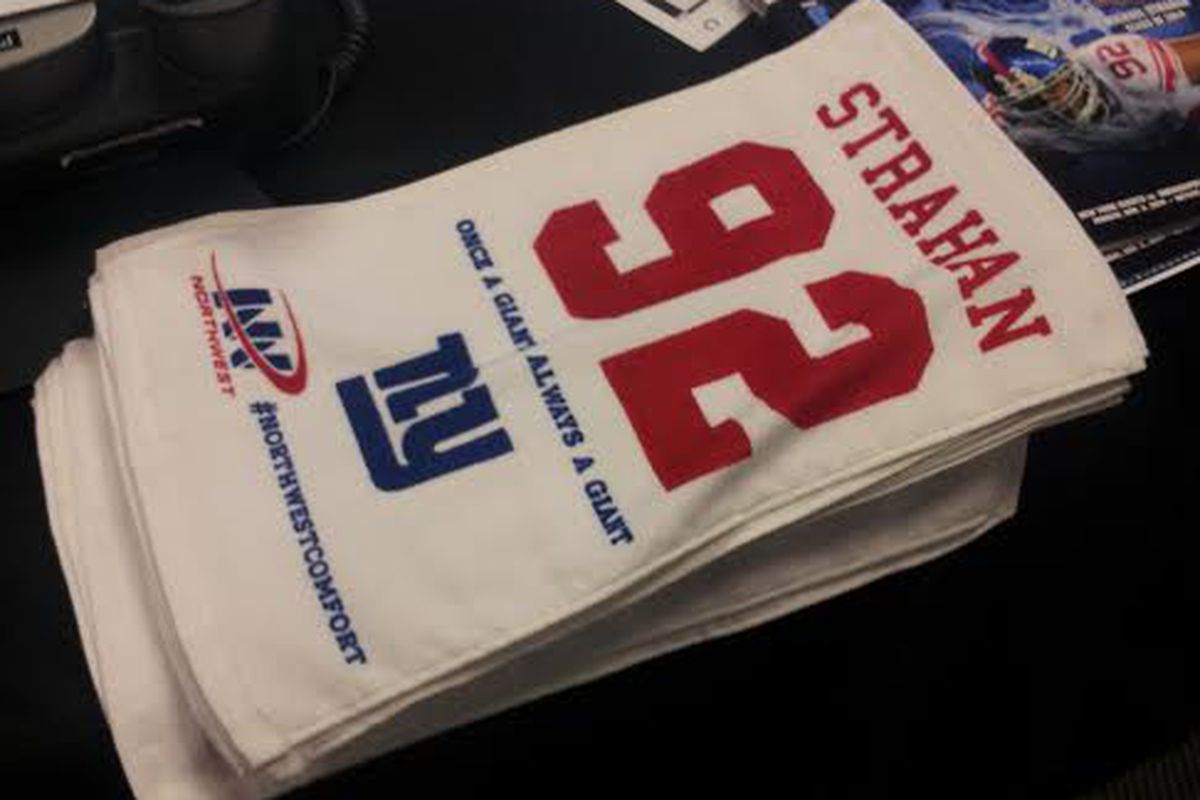 Fans received Strahan 92 towels at MetLife Stadium Monday night