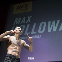 Max Holloway gestures at UFC 218 workouts.