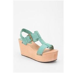 <a href="http://www.urbanoutfitters.com/urban/catalog/productdetail.jsp?id=23612492&color=040"> Ecote t strap wedge</a>, $59 urbanoutfitters.com