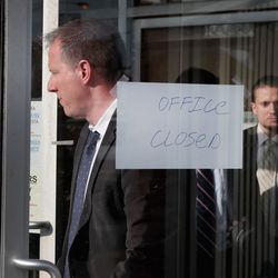 Federal agents leave the Southside office of 14th Ward Alderman Ed Burke. | Scott Olson/Getty Images